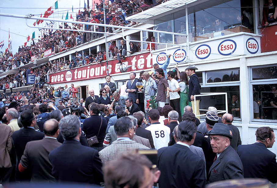 Podium ceremony with the winning teams, prominently Helmut Marko (A) and team mate Gijs van Lennep (NL) after 24 hours and 397 laps with the Porsche 917K 053 of Martini International Racing Team