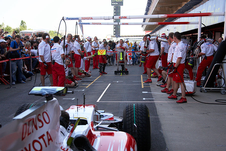 The Toyota pit crew practises pit stops on thursday afternoon