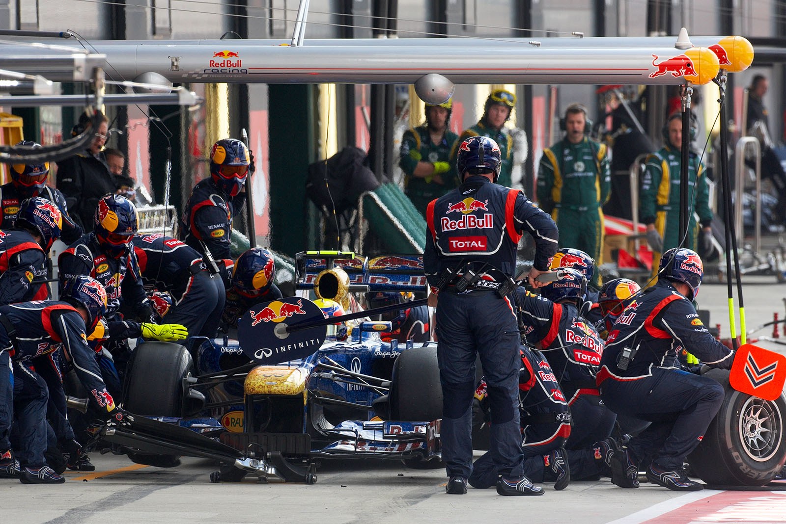 Mark Webber receives new tyres at Red Bull Racing pits