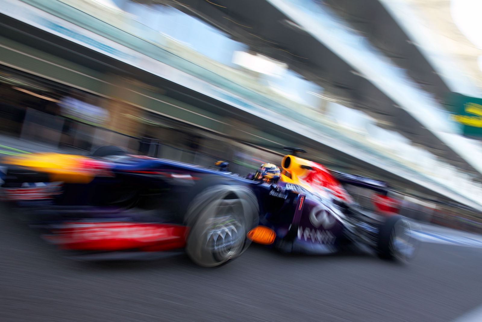 Sebastian Vettel, Red Bull-Renault, drives out of the pits on Saturday practice session