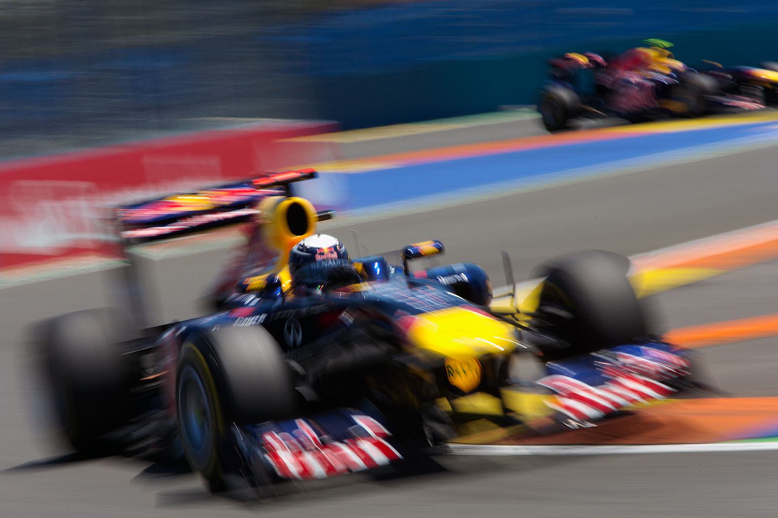 Sebastian Vettel, Red Bull Racing, leads team mate Webber