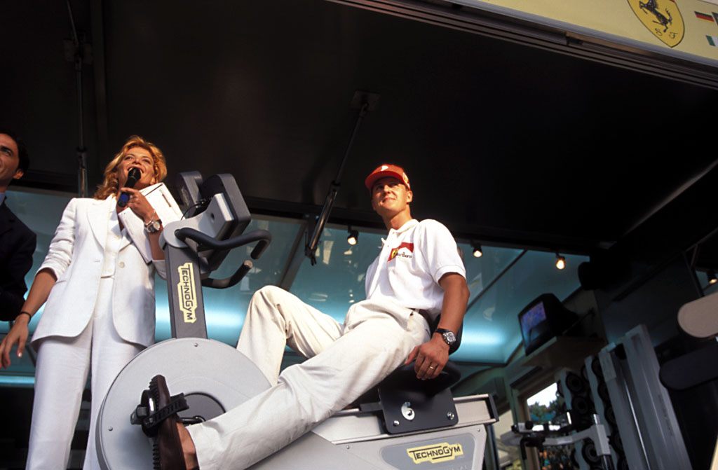 Schumacher presents a new fitness tool from sponsor TechnoGym.