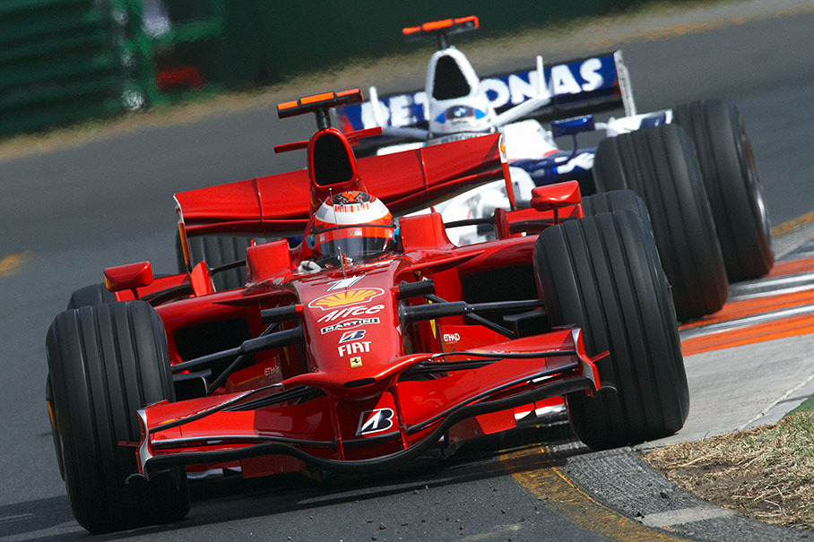Ferrari driver Kimi Raikkonen in front of BMW Sauber's Nick Heidfeld