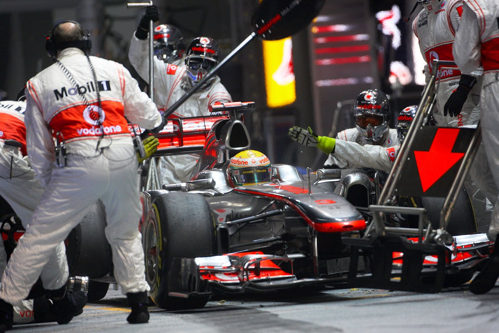 Lewis Hamilton ejects from McLaren pits