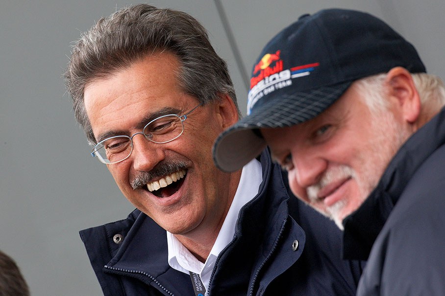 BMW Motorsport director Dr. Mario Theissen enjoys a chat with Sebastian's father Norbert Vettel