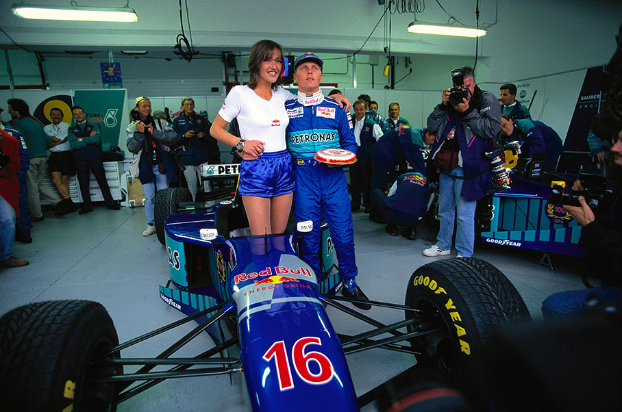 Johnny Herbert celebrates his 100th Grand Prix in the Sauber pits