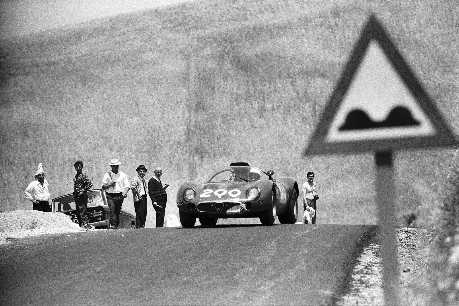 The Alfa Romeo T33 of 'Geki' (I) and Nino Todaro (I)