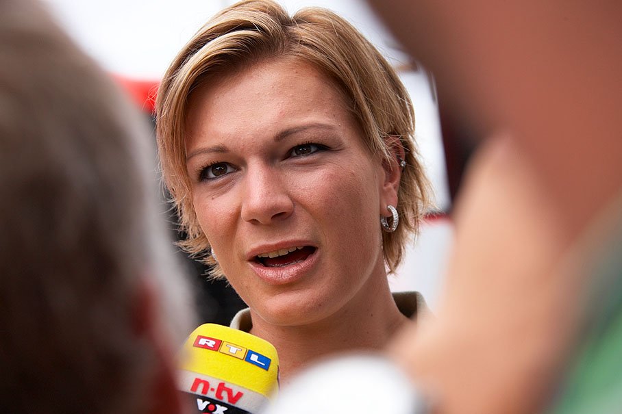 German Olympic Alpine Ski racer Champion Maria Riesch visits the paddock as VIP and is interviewed by German TV