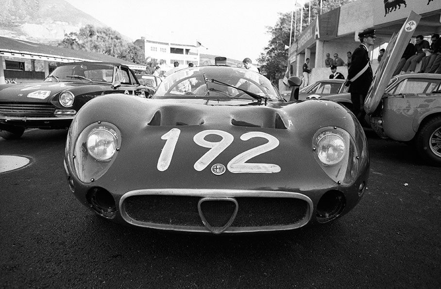 The Alfa Romeo T33 driven by Nanni Galli (I) and Ignazio Giunti (I) in parc ferme