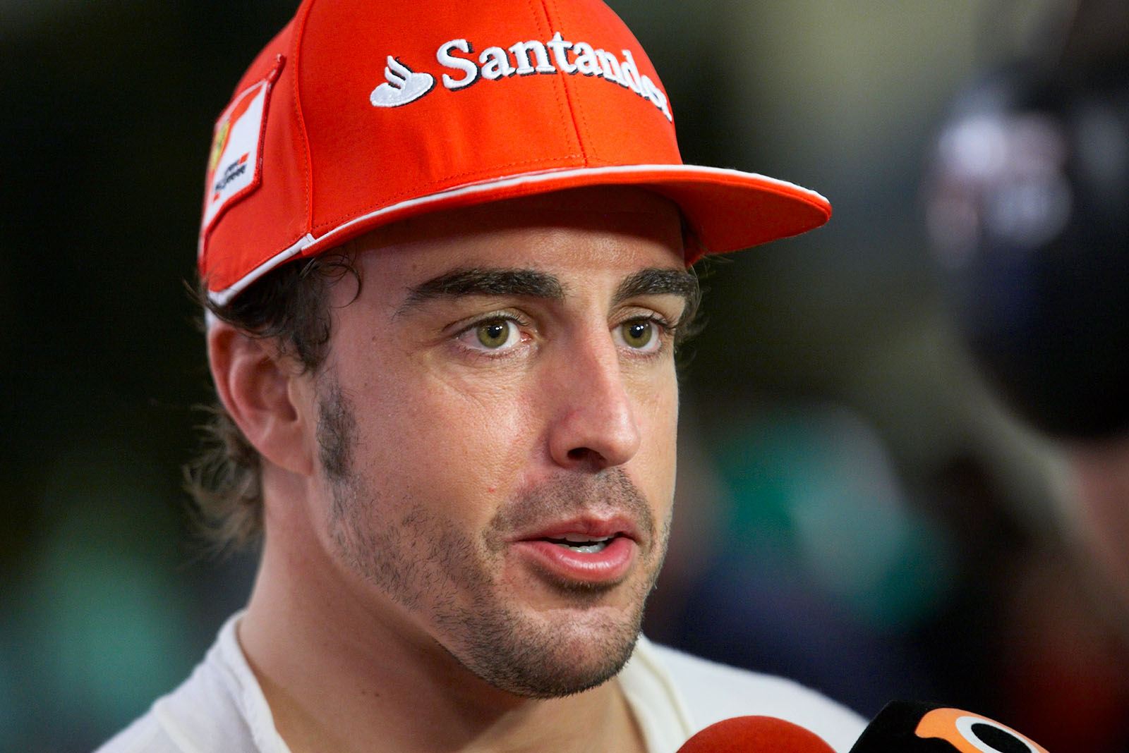 Second placed Fernando Alonso of Ferrar gives an interview after the Abu Dhabi Grand Prix