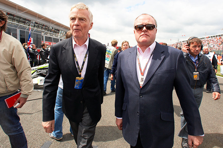 FIA President Max Mosley promenades over the grid with his deputy and FIA's chief steward Alan Donnelly