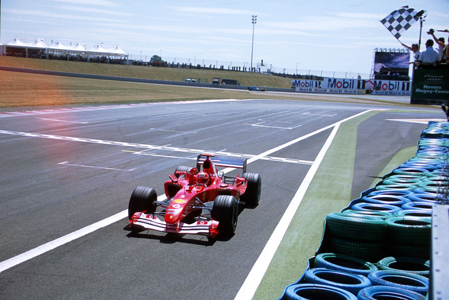 Michael Schumacher recieving chequered flag