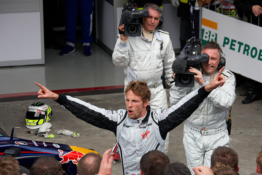 Jenson Button celebrates his world championship title in parc ferme