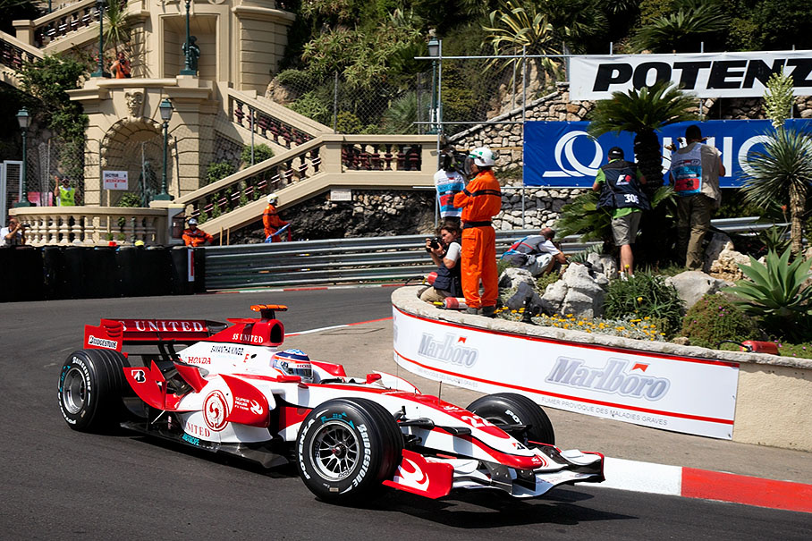 Super Aguri's Takuma Sato at Loews hairpin