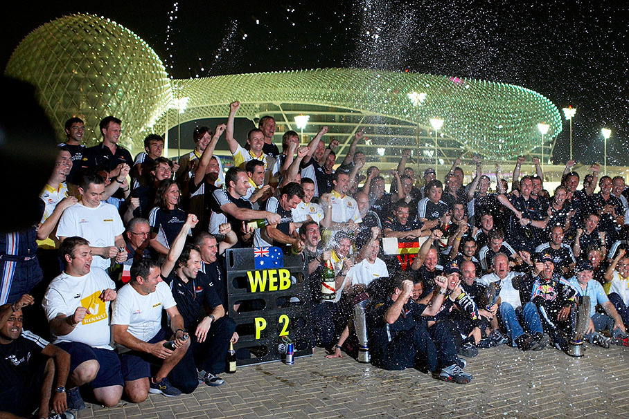 The Red Bull team celebrates their season's achievements after Abu Dhabi's first Grand Prix, the last race in 2009