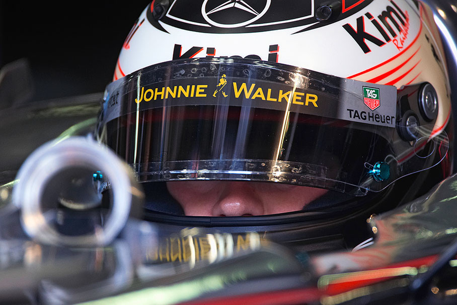 McLaren driver Kimi Raikkonen cooling down with half closed visor