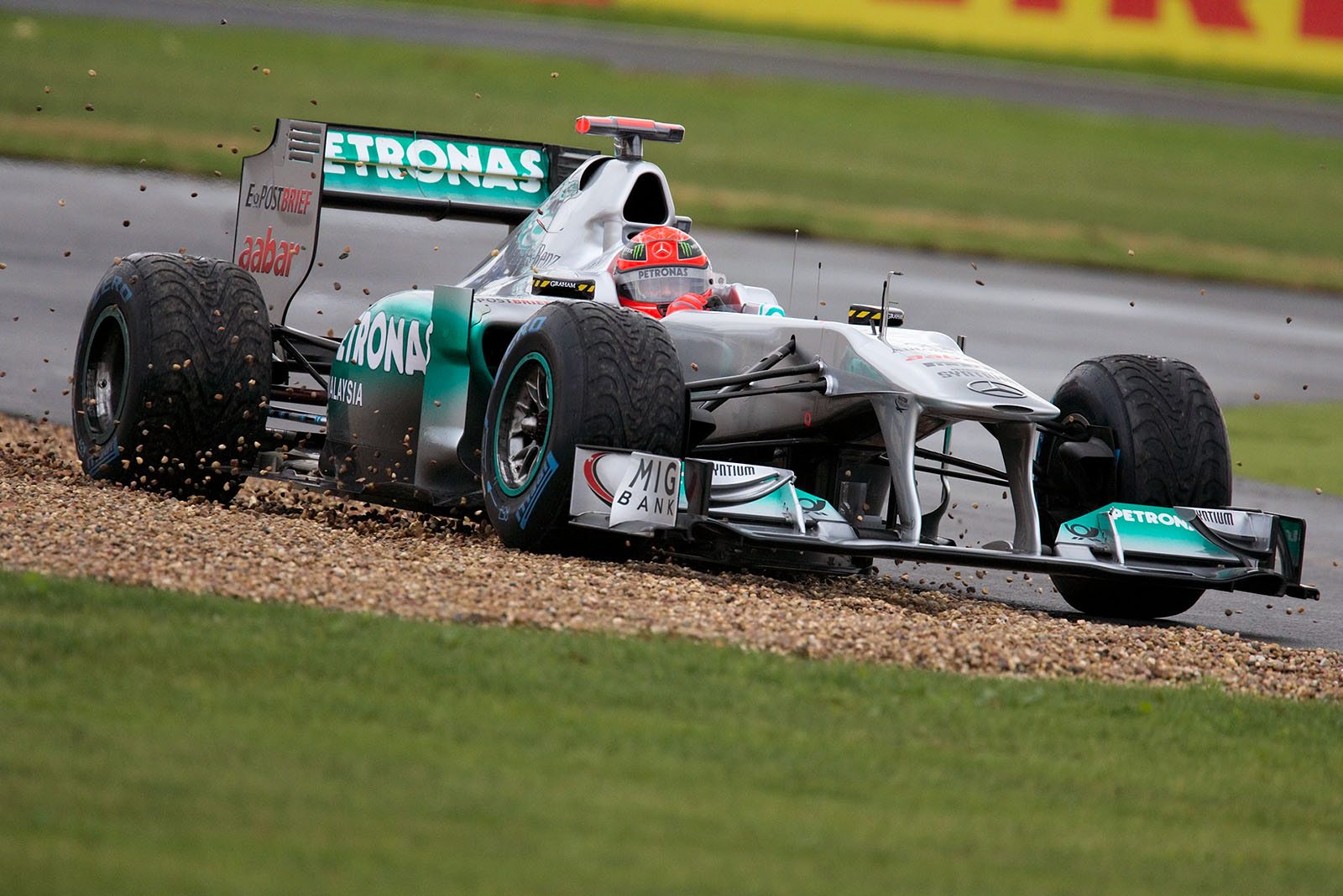 Michael Schumacher, Mercedes GP, rides through the gravel