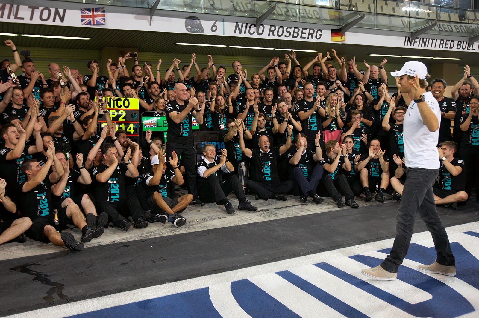 Runner-up in the 2014 Formula 1 World Championship, Nico Rosberg of Mercedes, gets a warm welcome from his team, Abu Dhabi Grand Prix, 2014