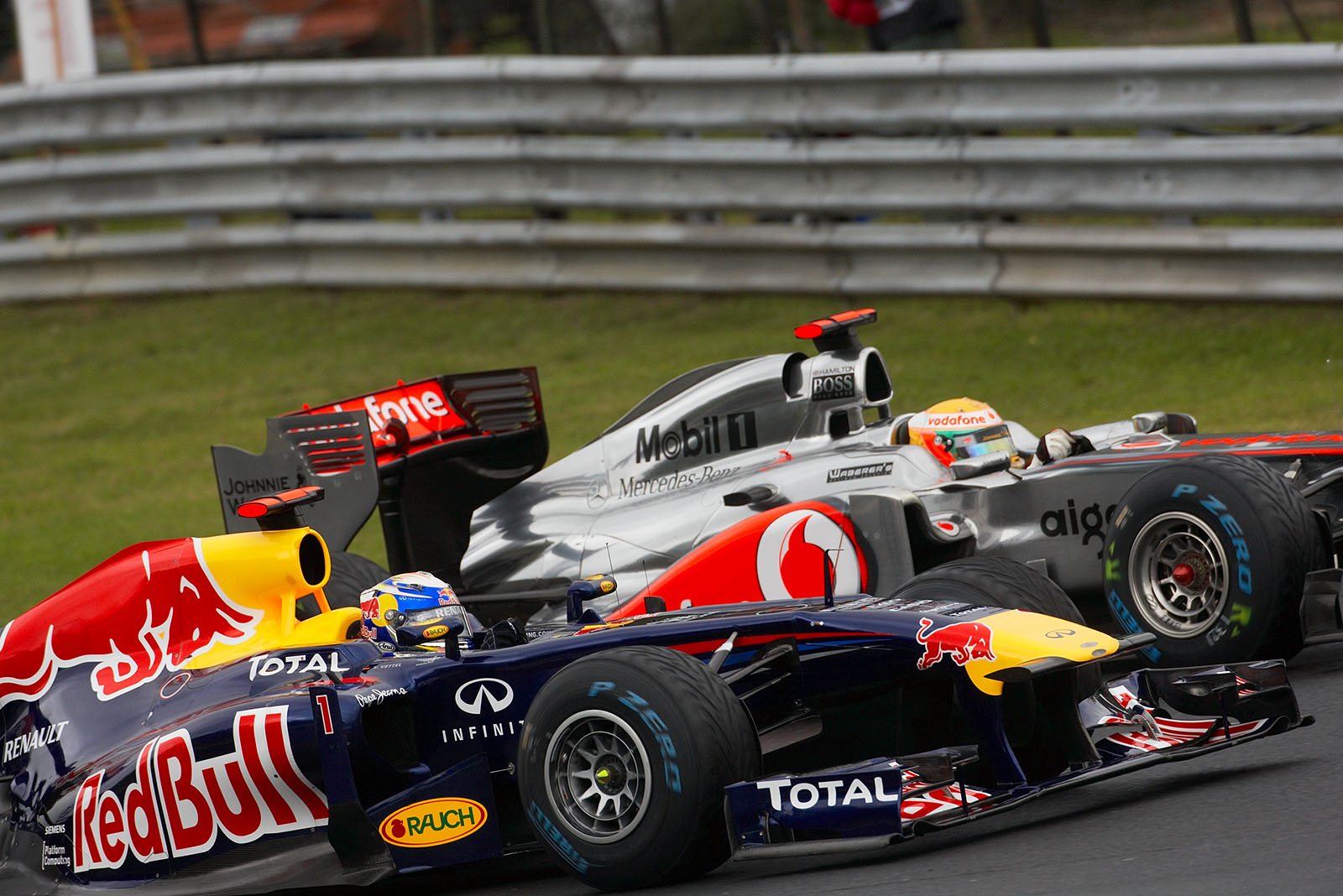 Lewis Hamilton, McLaren Mercedes, tries to overtake the leading Sebastian Vettel