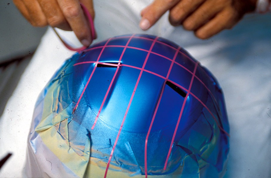 Peter Ginneken of BELL Helmets S.A. making the artwork of the 1998 Suzuka race helmet for Michael Schumacher