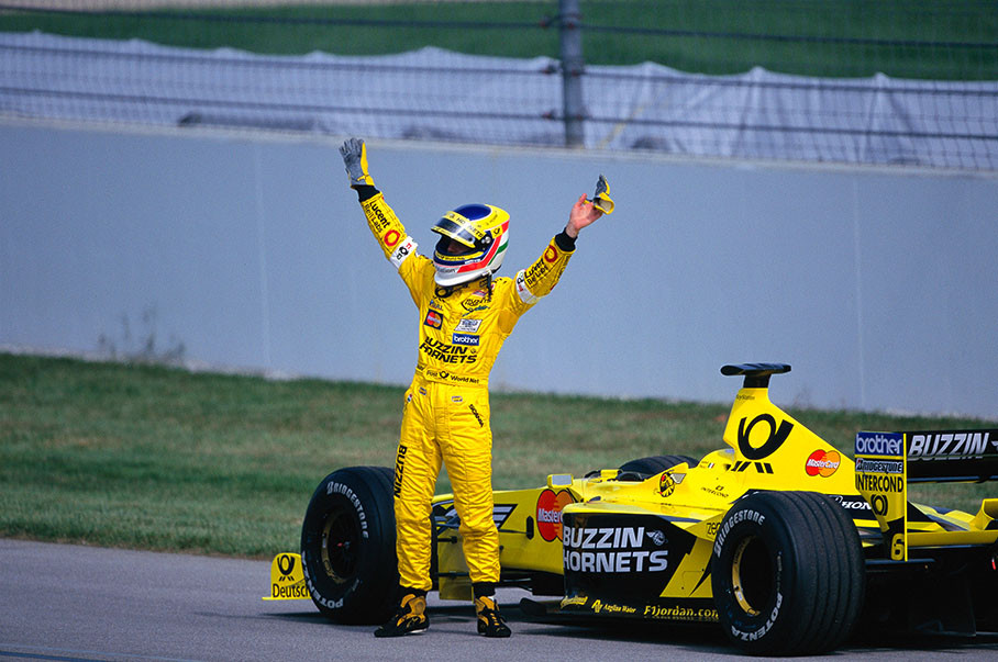 Jarno Trulli greets his fans after retiring in lap 12 with mechanical problems