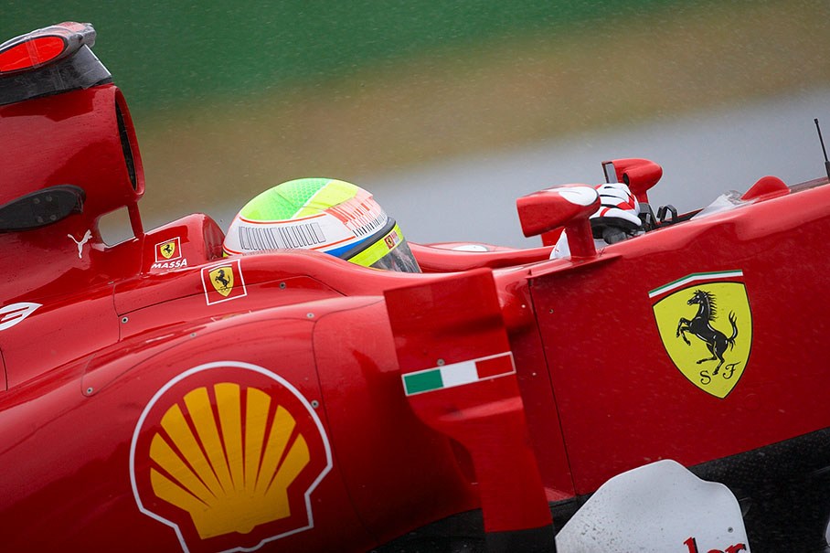 Felipe Massa, Ferrari, steers through the hairpin during a rainy practice session in Hockenheim
