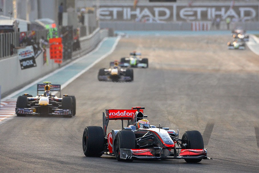 Lewis Hamilton, McLaren Mercedes, leads the two Red Bull-Renaults
