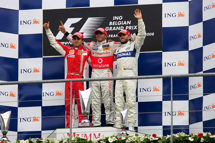Podium group photo: second placed Massa, winner Hamilton and third placed Heidfeld (before the FIA stewards' decision)