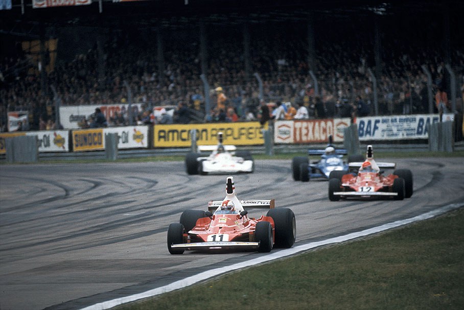 Clay Regazzoni, Ferrari 312T, still in front of team mate Lauda