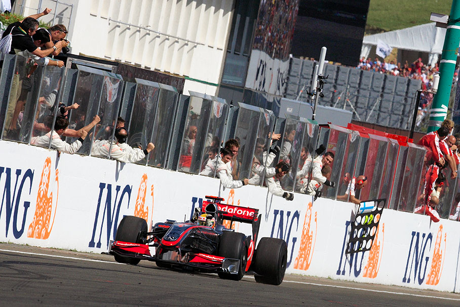 Lewis Hamilton, McLaren Mercedes, wins the Hungarian Grand Prix and passes his cheering team
