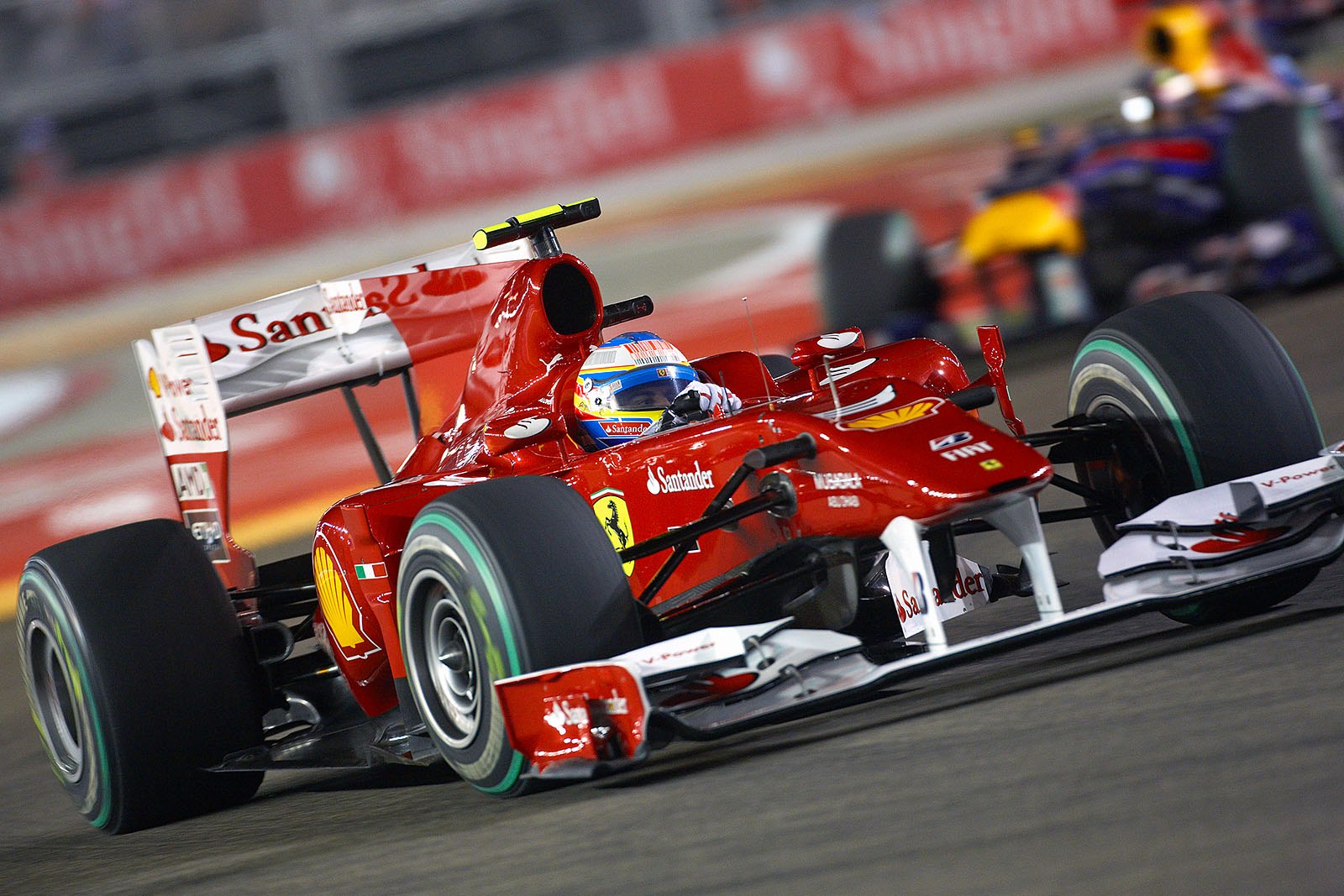 Ferrari's Fernando Alonso leading Vettel