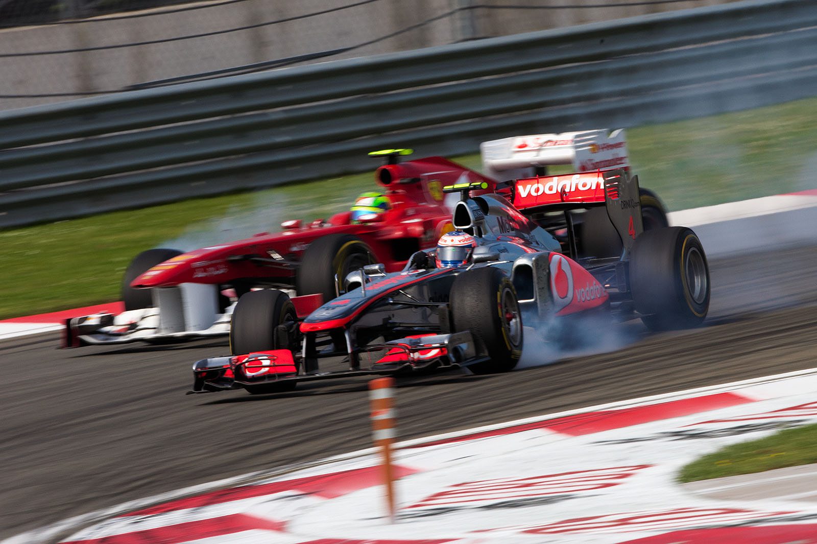 Massa loses the fight with McLaren's Jenson Button