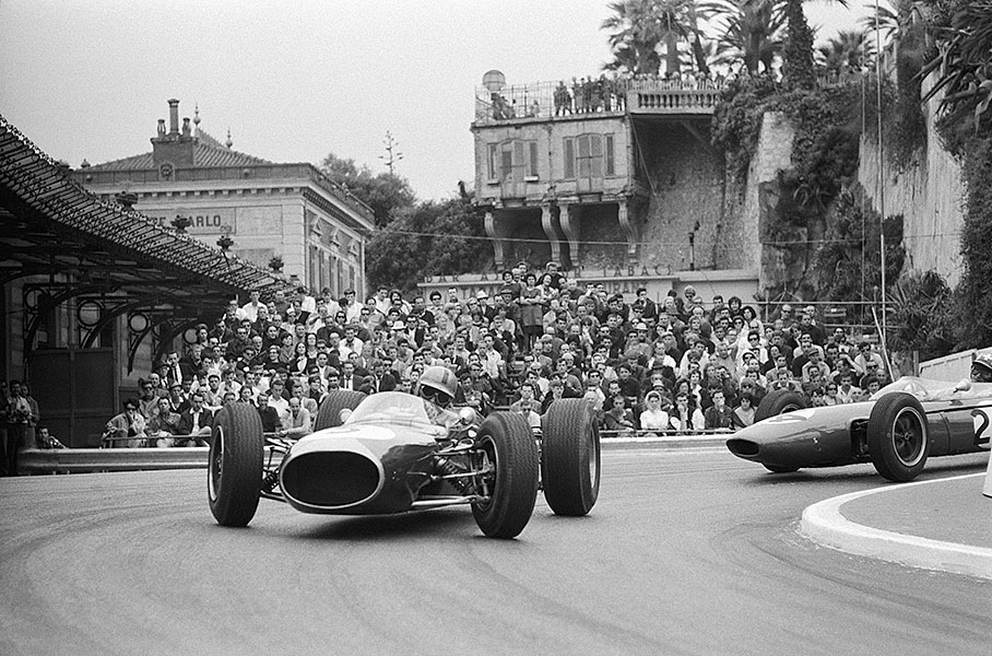 Jack Brabham leading Jo Siffert through the old railway station hairpin