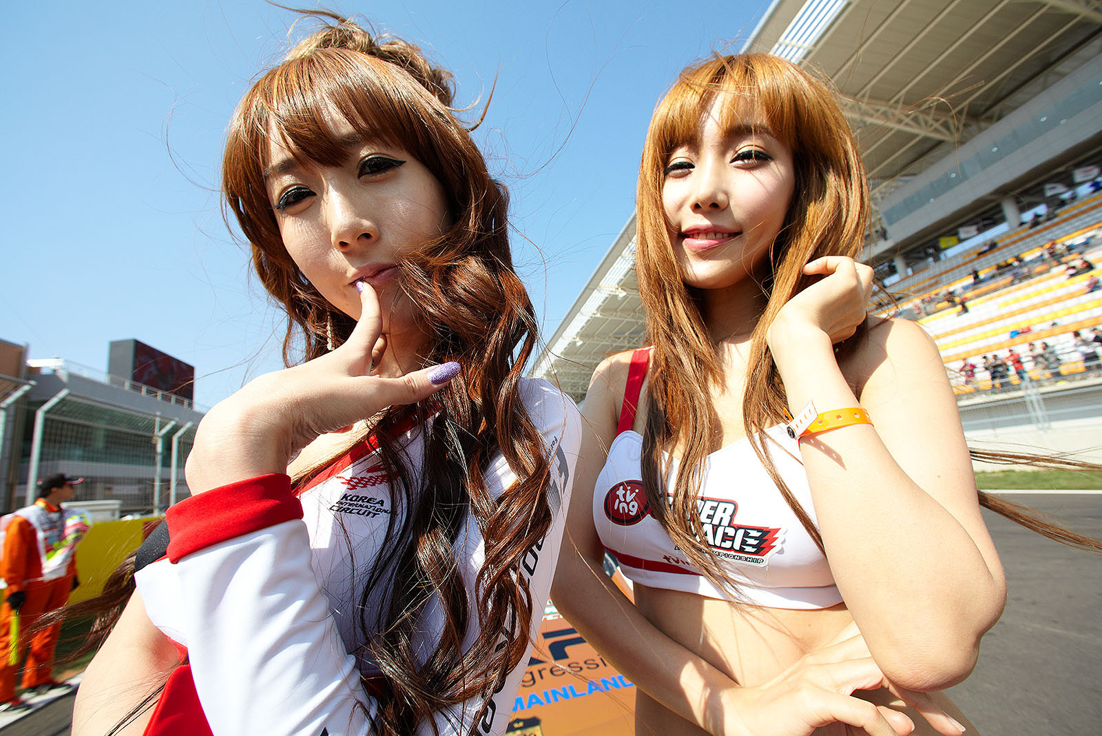 Two advertising ladies on the grid
