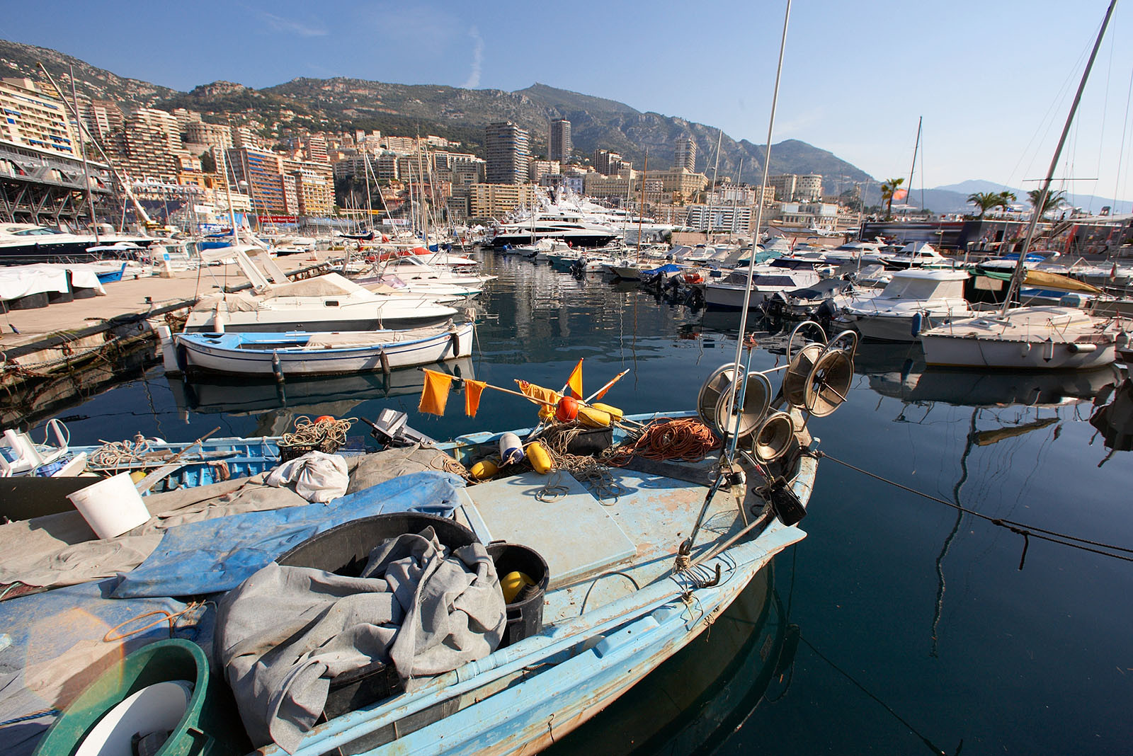 Monaco harbour filled with luxurious and sometimes less luxurious boats and yachts.