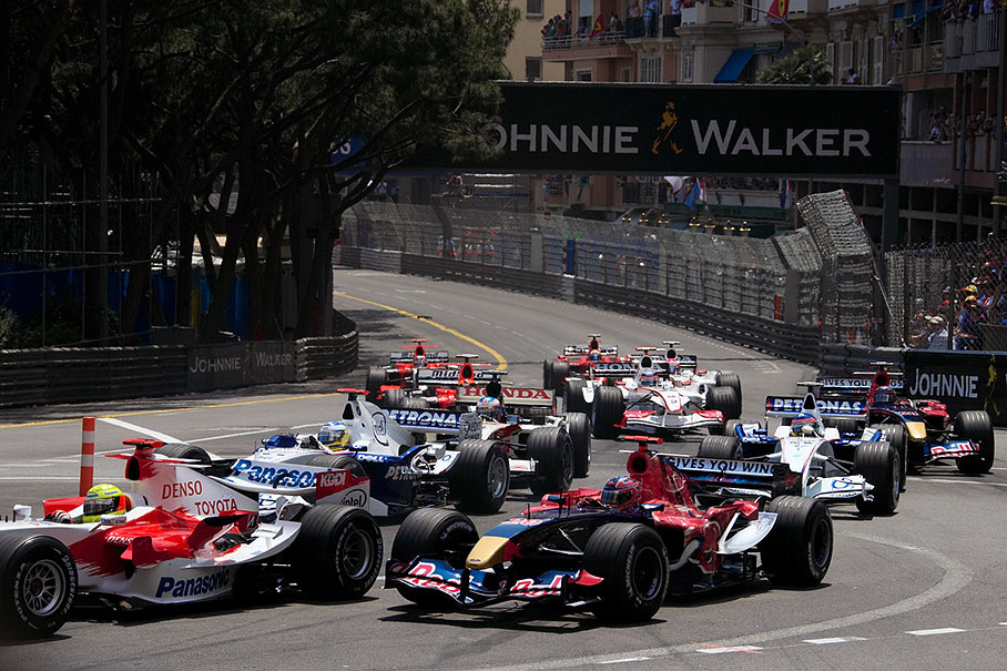 Backmarkers heading into first corner